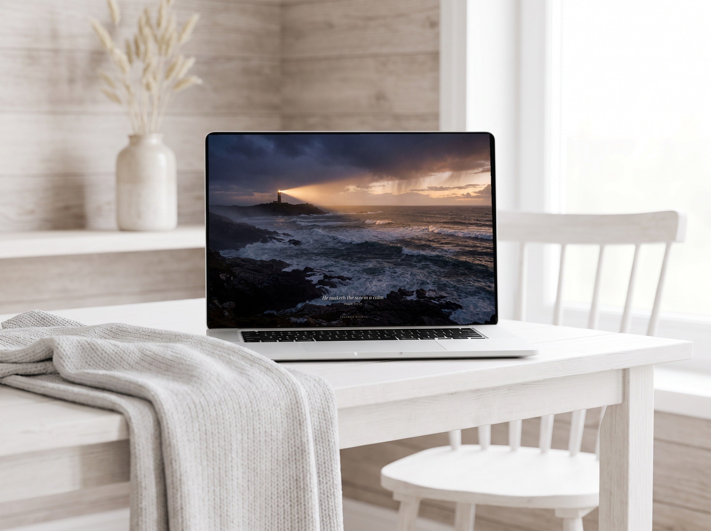 The Desired Haven desktop wallpaper on a laptop