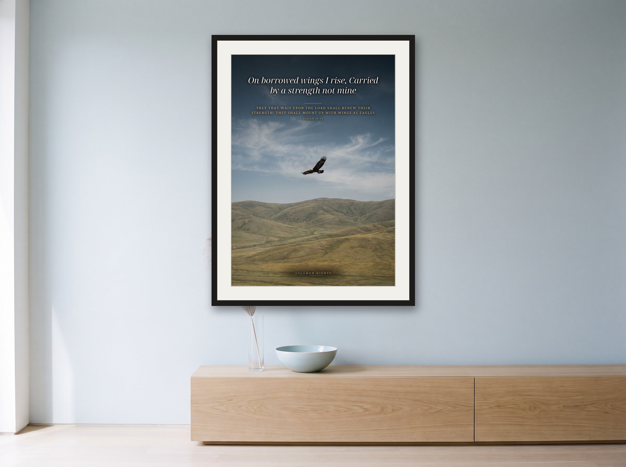 On Borrowed Wings print framed on a wall